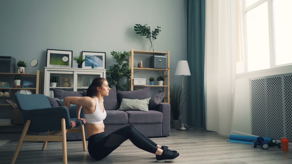 Woman performing home workout exercise